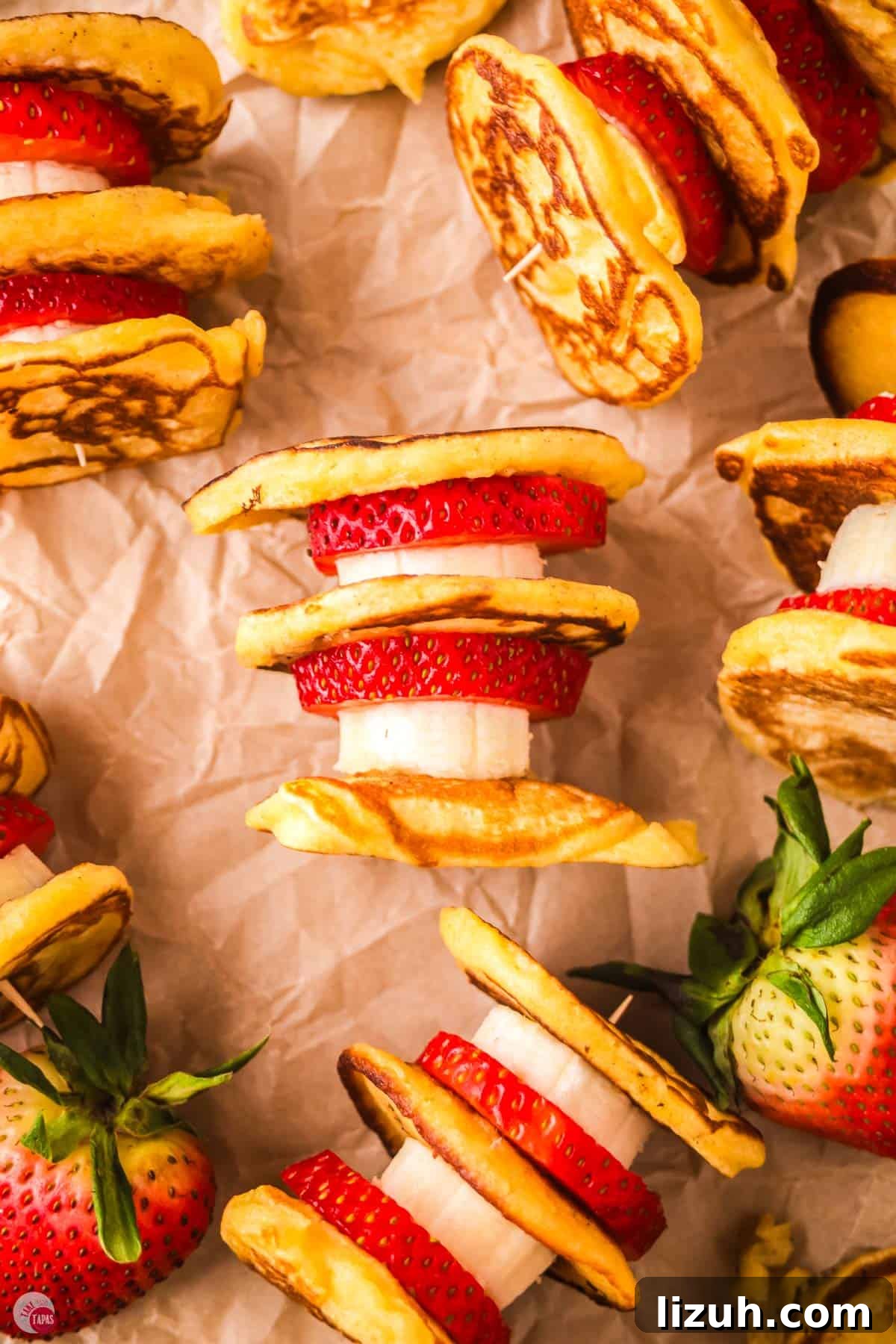 lots of pancake skewers on parchment paper
