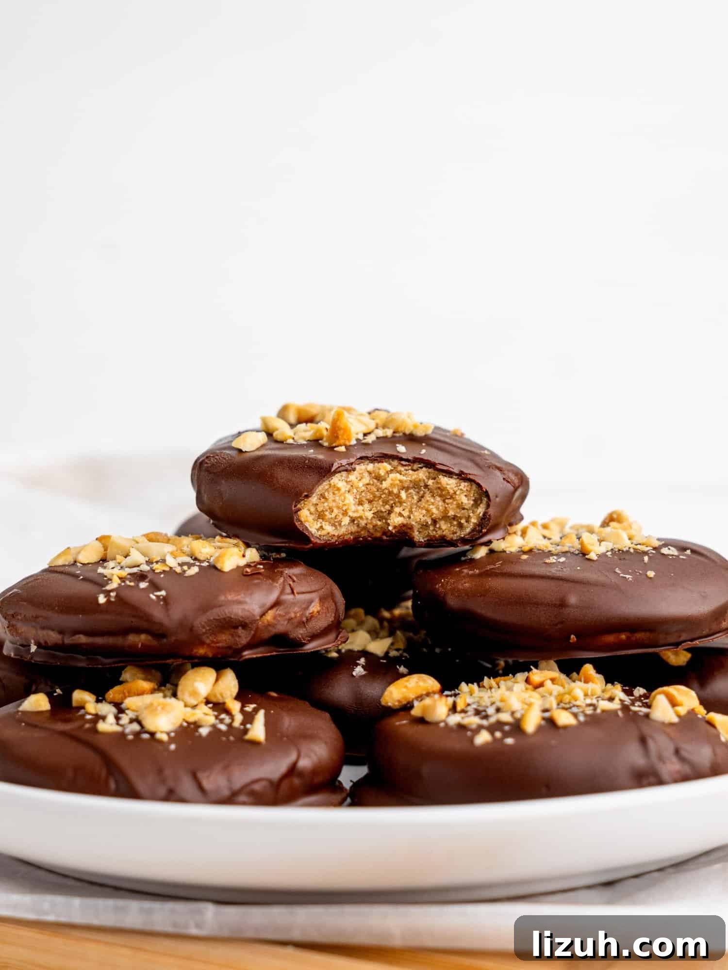 No bake peanut butter cookies on a white plate.