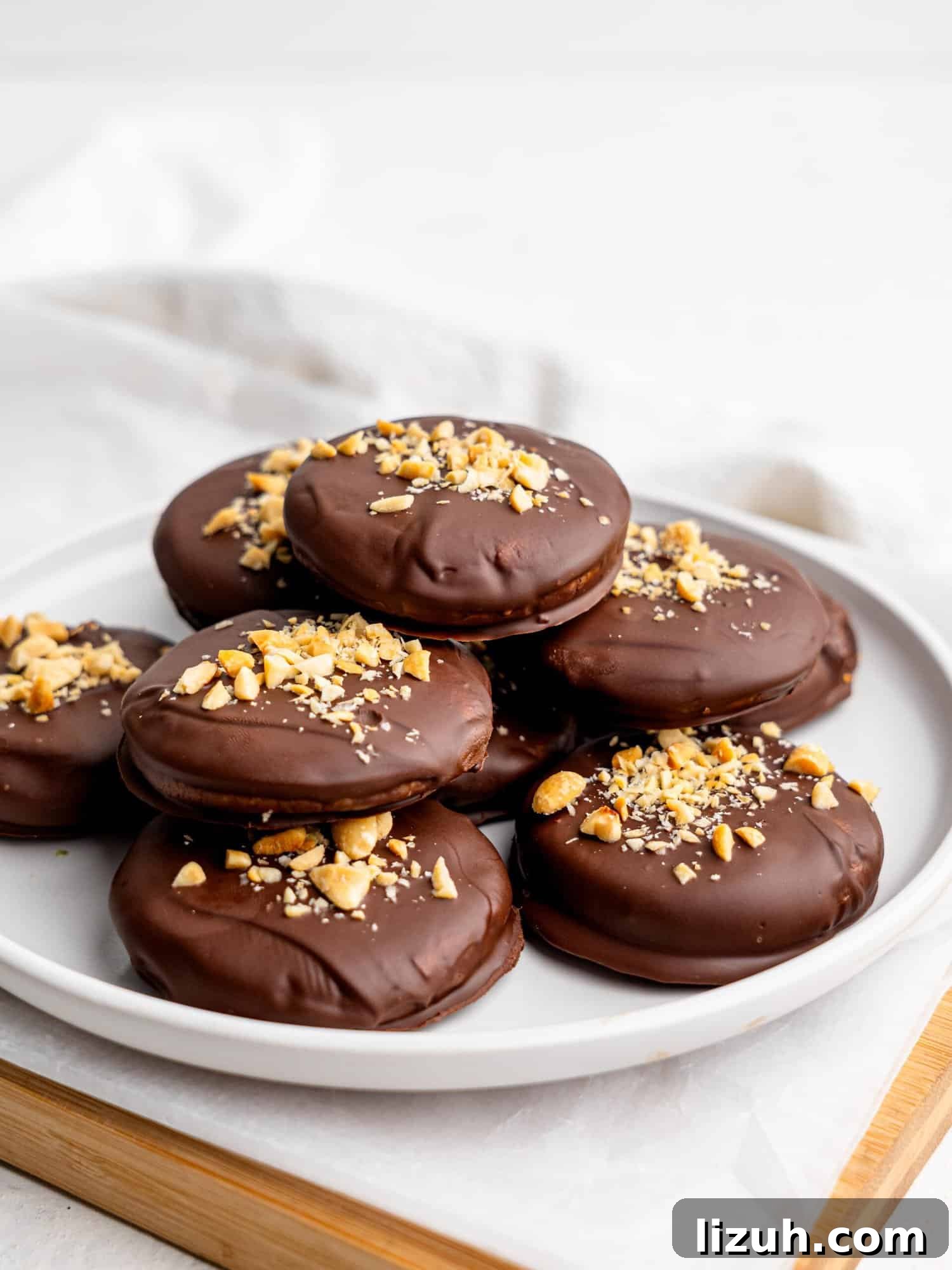 No bake peanut butter cookies on a white plate.