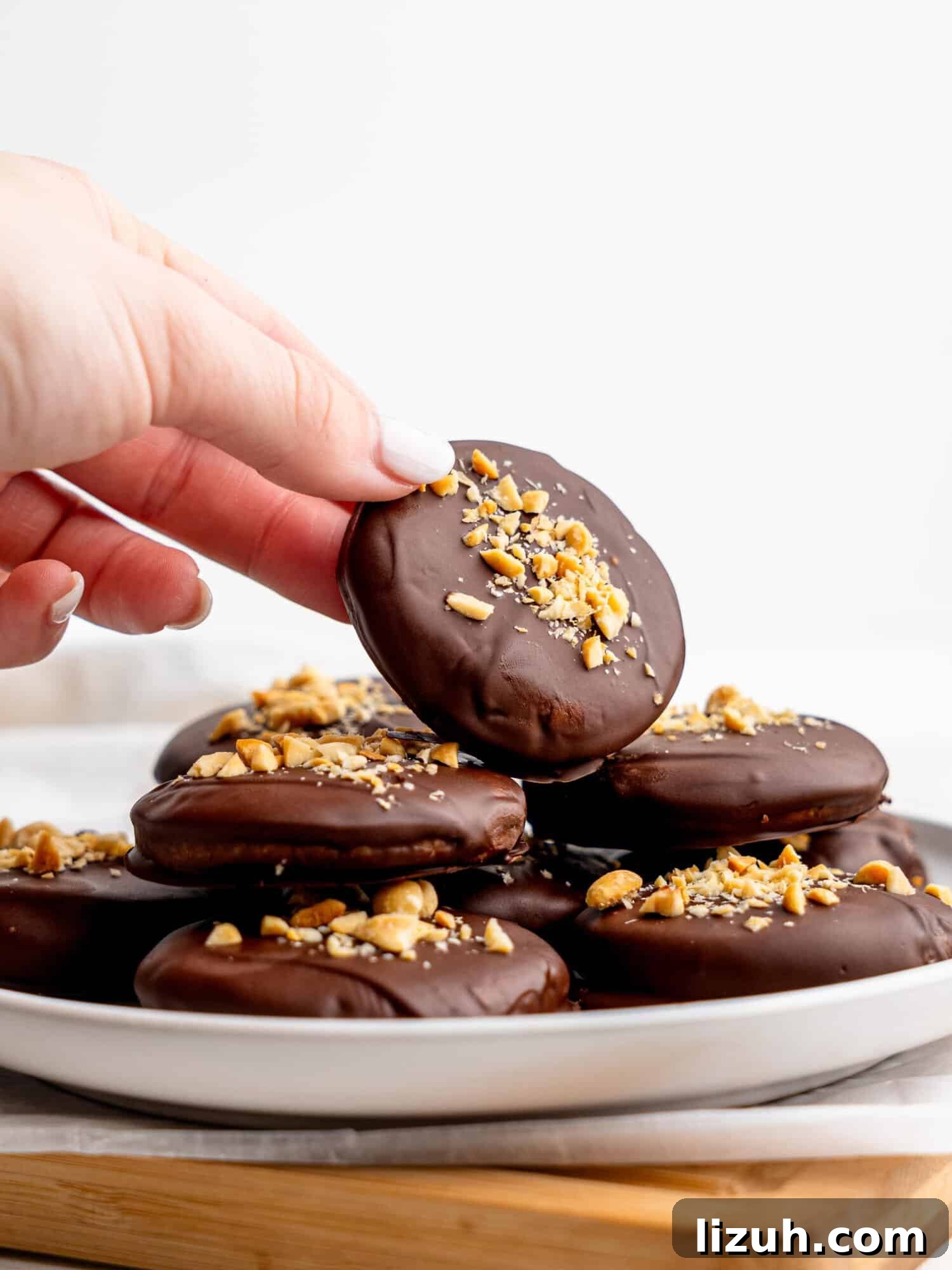 No bake peanut butter cookies on a white plate.