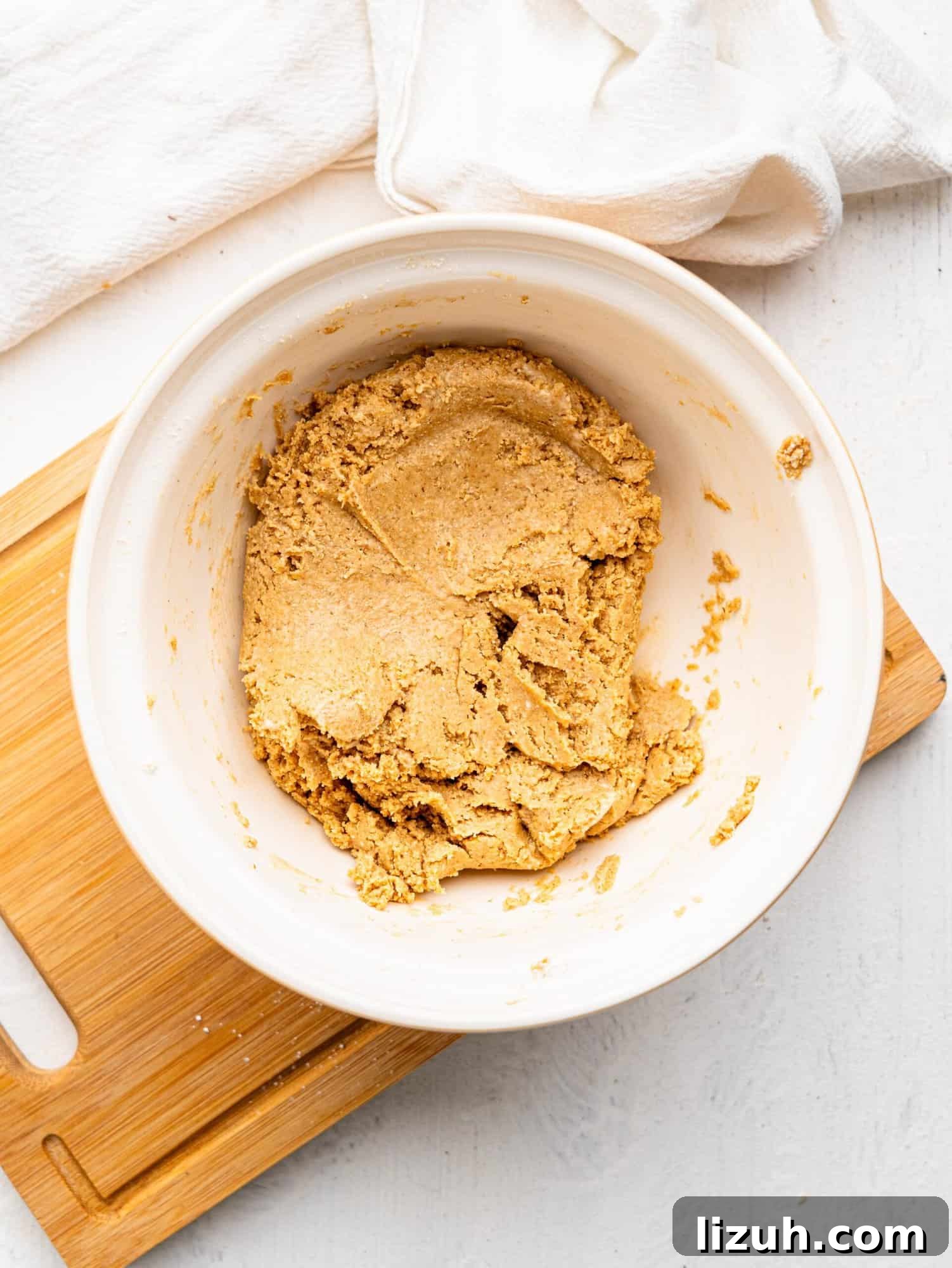 Peanut butter cookie dough in a bowl.