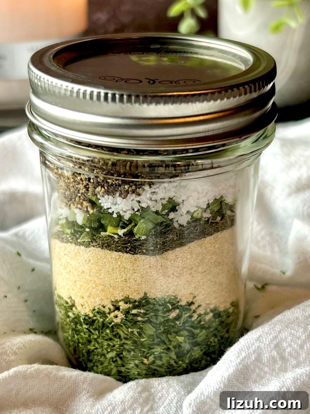 Dairy-Free Homemade Ranch Seasoning Mix Recipe 4 Shaking ranch seasoning in jar
