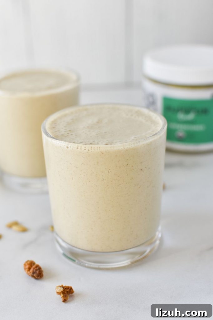 Two seed smoothies next to a jar of pumpkin seed butter