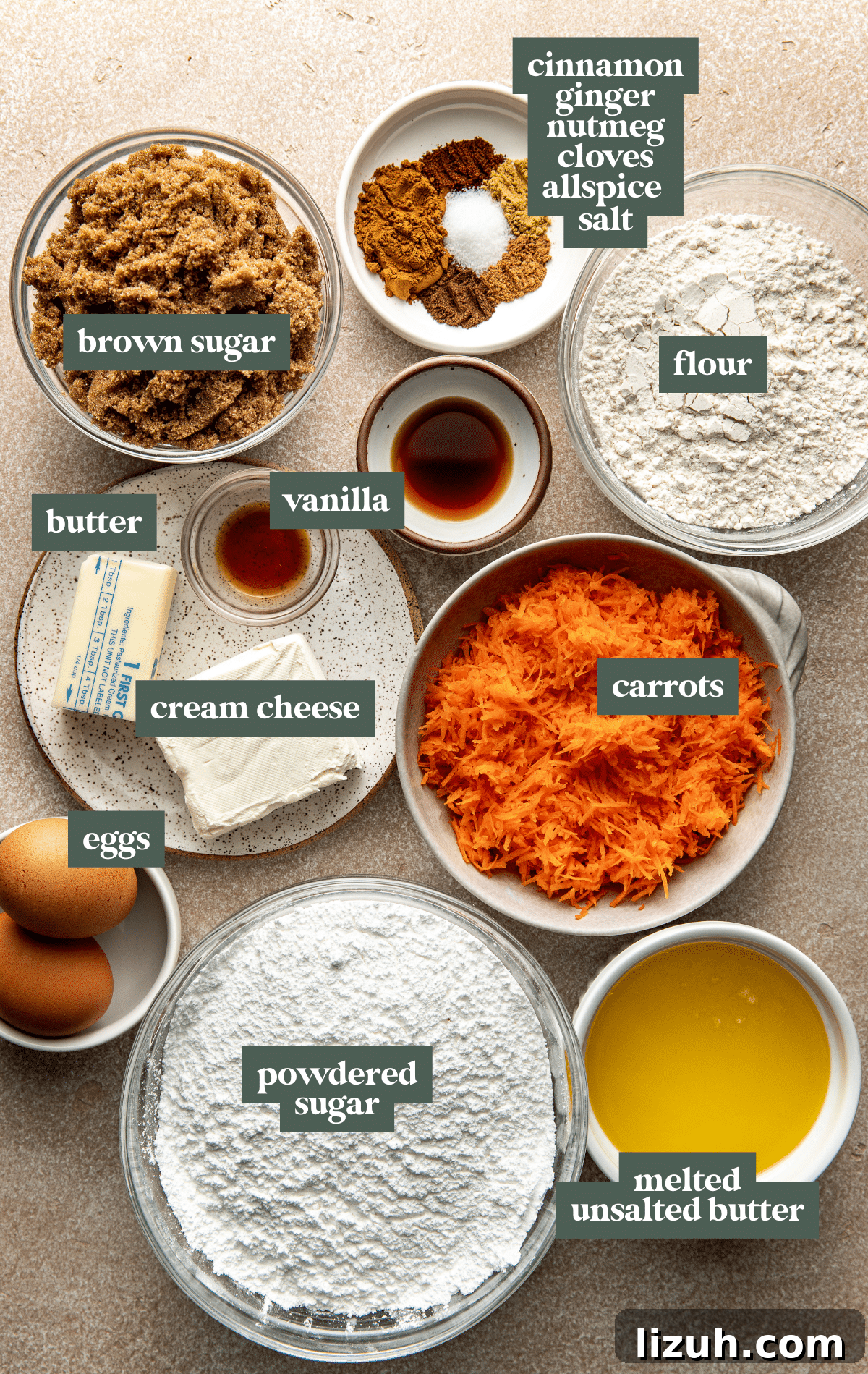 Chewy Carrot Cake Bars with Cream Cheese Frosting Recipe 5 Flat lay of ingredients for carrot cake bars including shredded carrots, brown sugar, melted butter, eggs, cream cheese, flour, spices, vanilla, and powdered sugar.