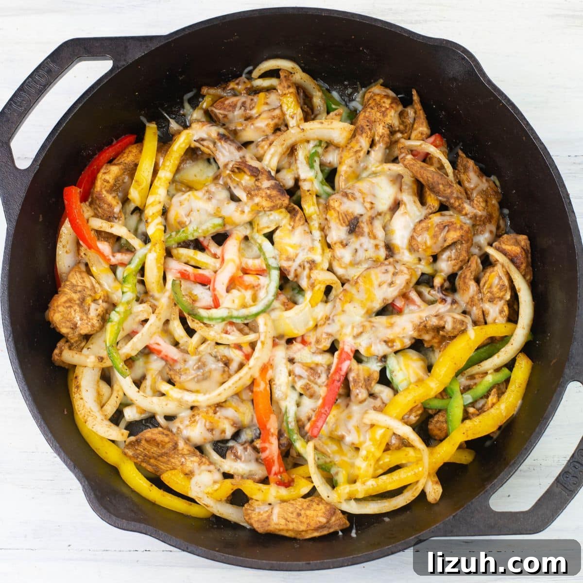 Chicken Fajita filling in a cast iron skillet.