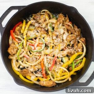 Chicken Fajita filling in a cast iron skillet.