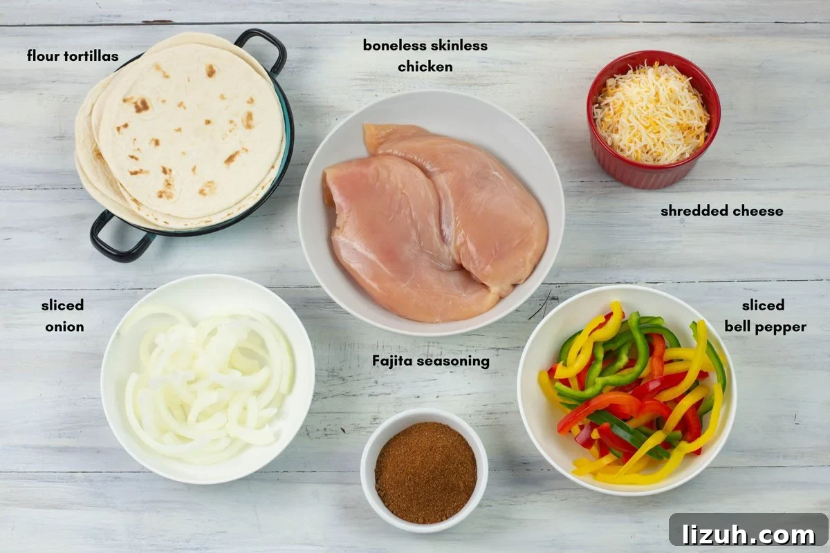 Six chicken fajita ingredients in small bowls.