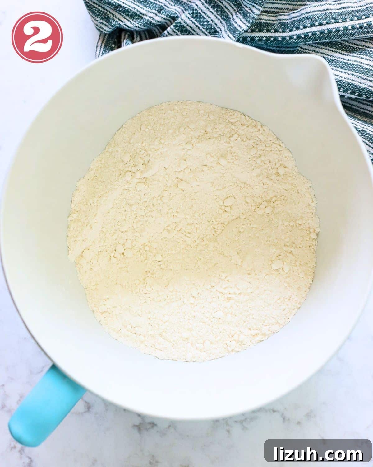 Moist Banana Bread with Crunchy Streusel Topping 7 Bowl with flour, baking soda, and salt.