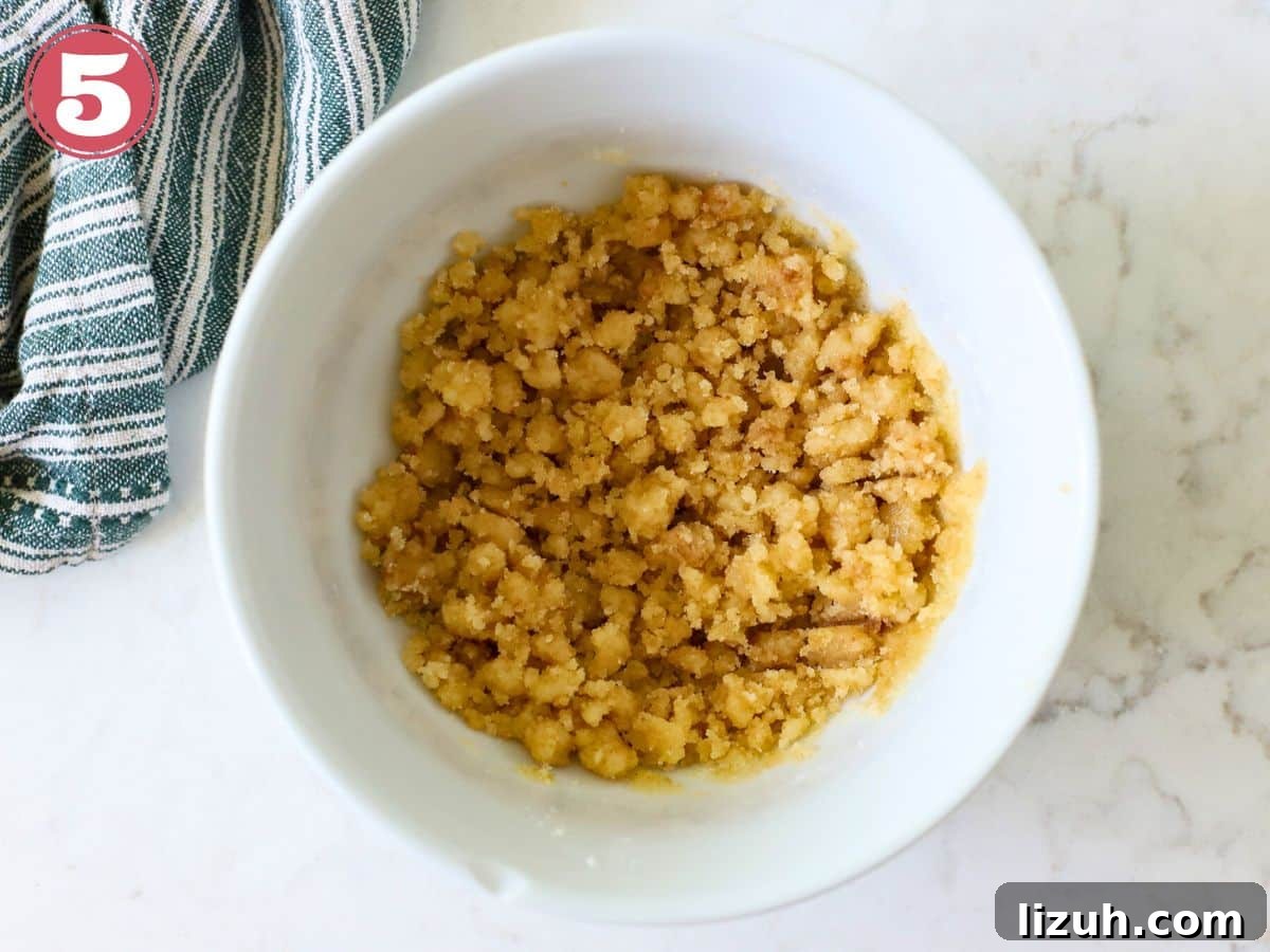 Moist Banana Bread with Crunchy Streusel Topping 9 Bowl with streusel topping.