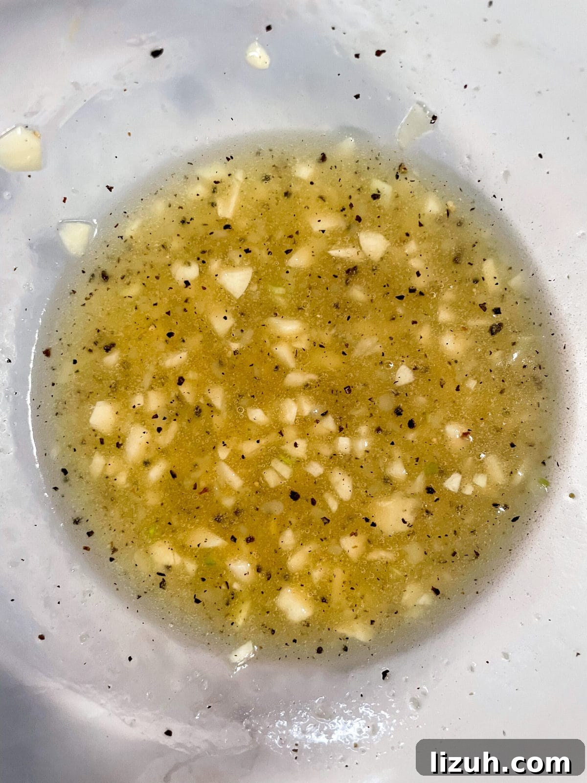 honey lemon butter sauce in a bowl