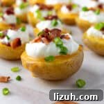 Baked Potato Bites on parchment.