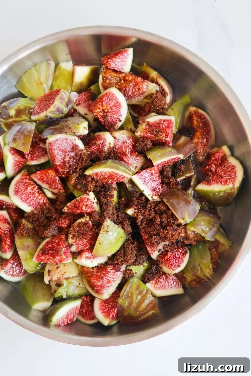 add figs to a pan with sugar and coconut oil