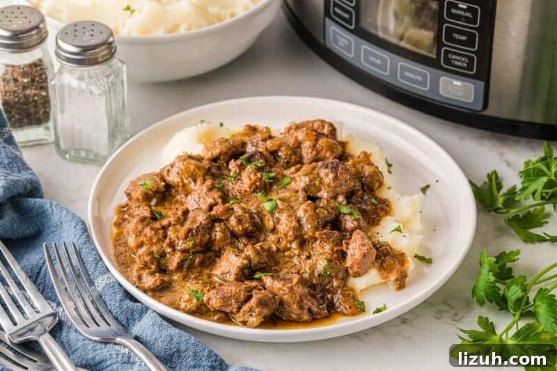 Slow Cooker Beef Sticks served on a white plate.