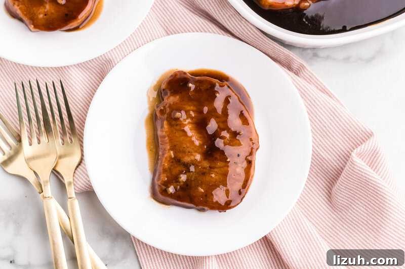 Teriyaki Pork Chops served on a white plate.
