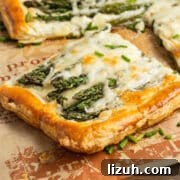 This is a picture of a slice of asparagus tart with Boursin.