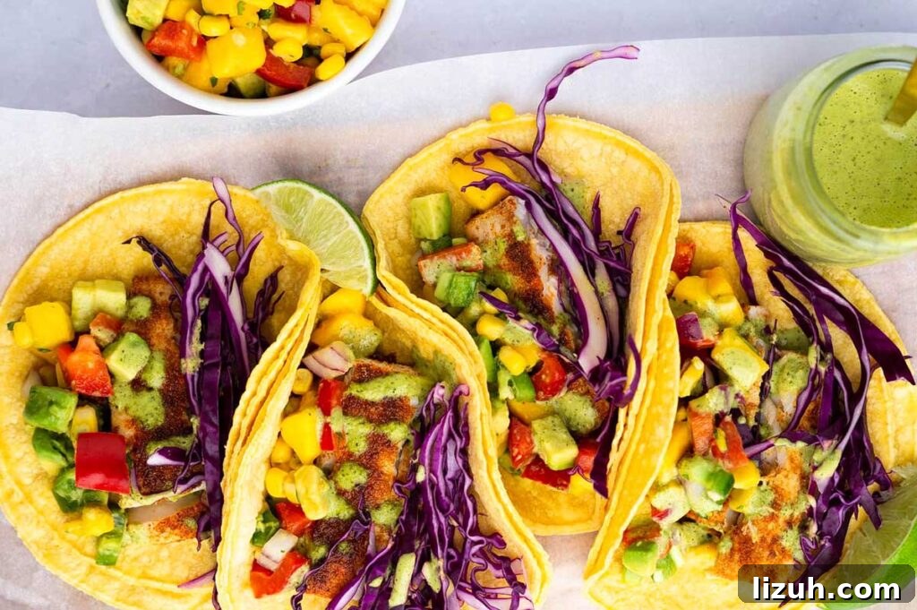 27 Delicious Taco Recipes for Any Night of the Week 21 A fish taco with fresh veggies.