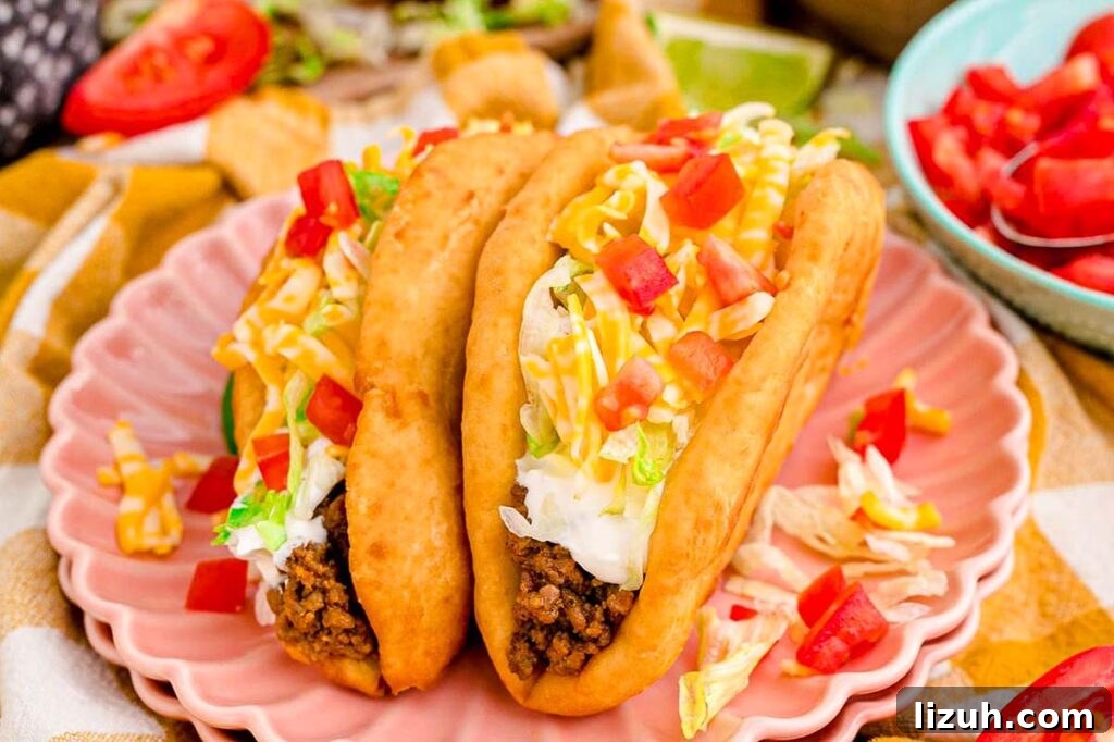 27 Delicious Taco Recipes for Any Night of the Week 24 Homemade chalupas on a plate.