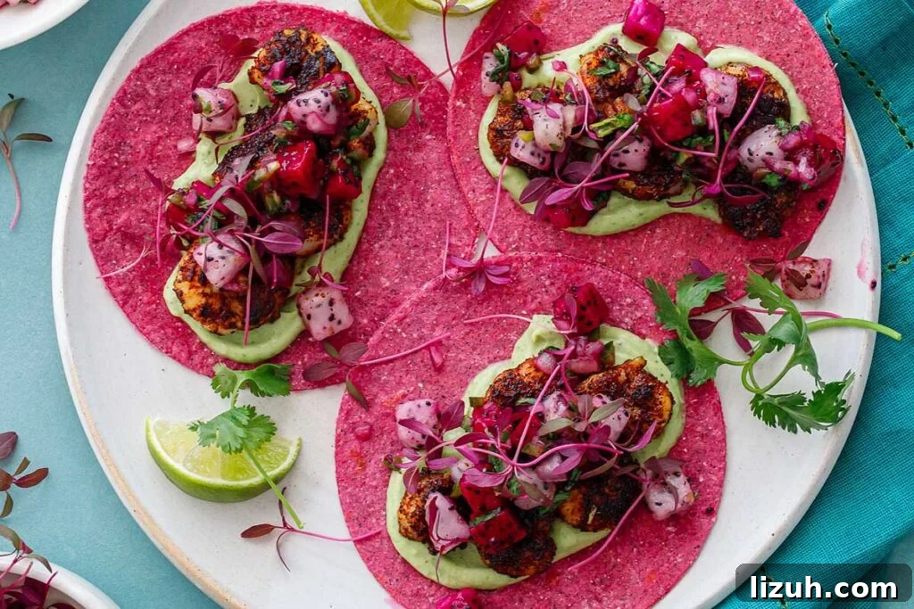 27 Delicious Taco Recipes for Any Night of the Week 25 Shrimp tacos on pink tortillas with dragonfruit salsa.