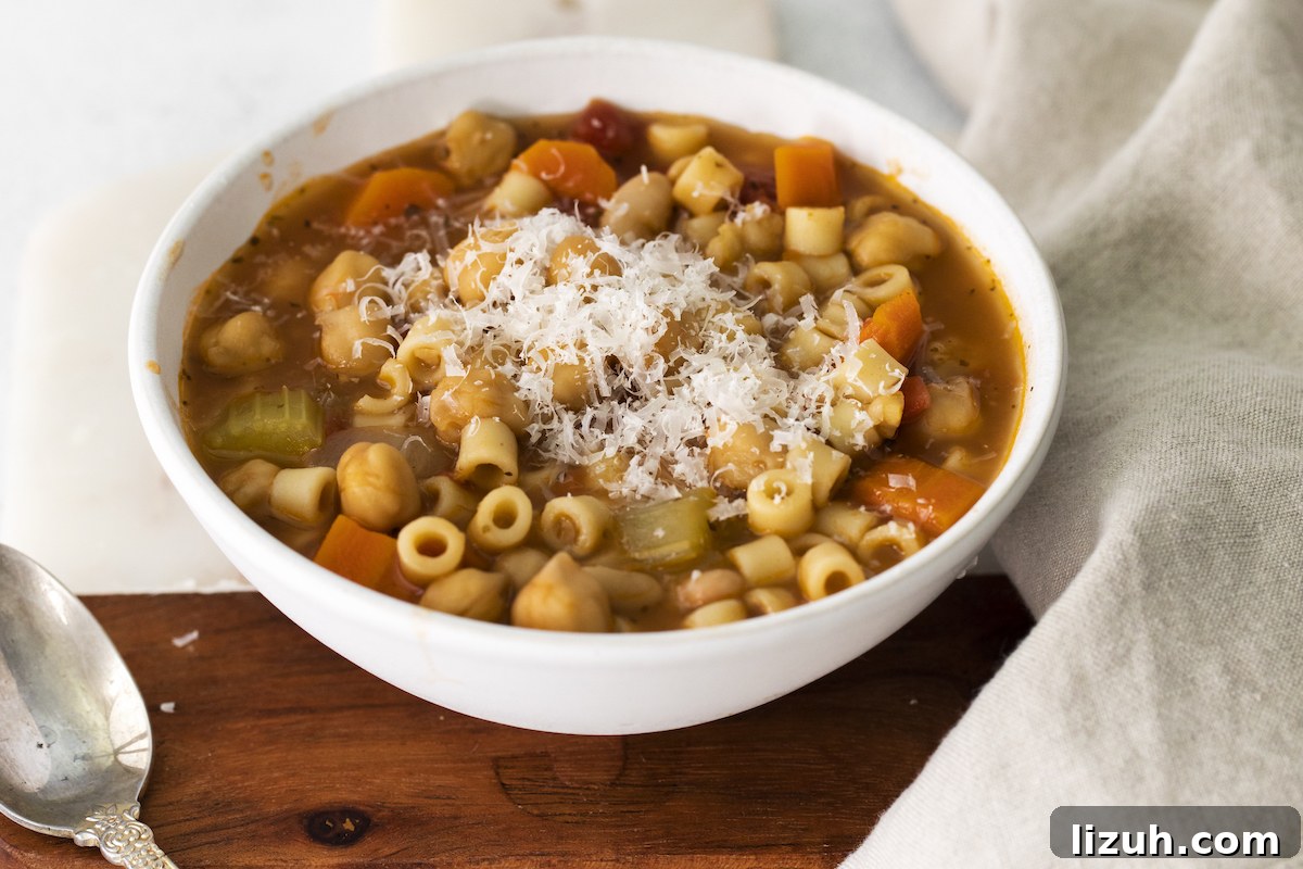 Creamy Chickpea Soup Recipe for Cozy Weeknight Meals 8 one serving of chickpea soup in a white bowl