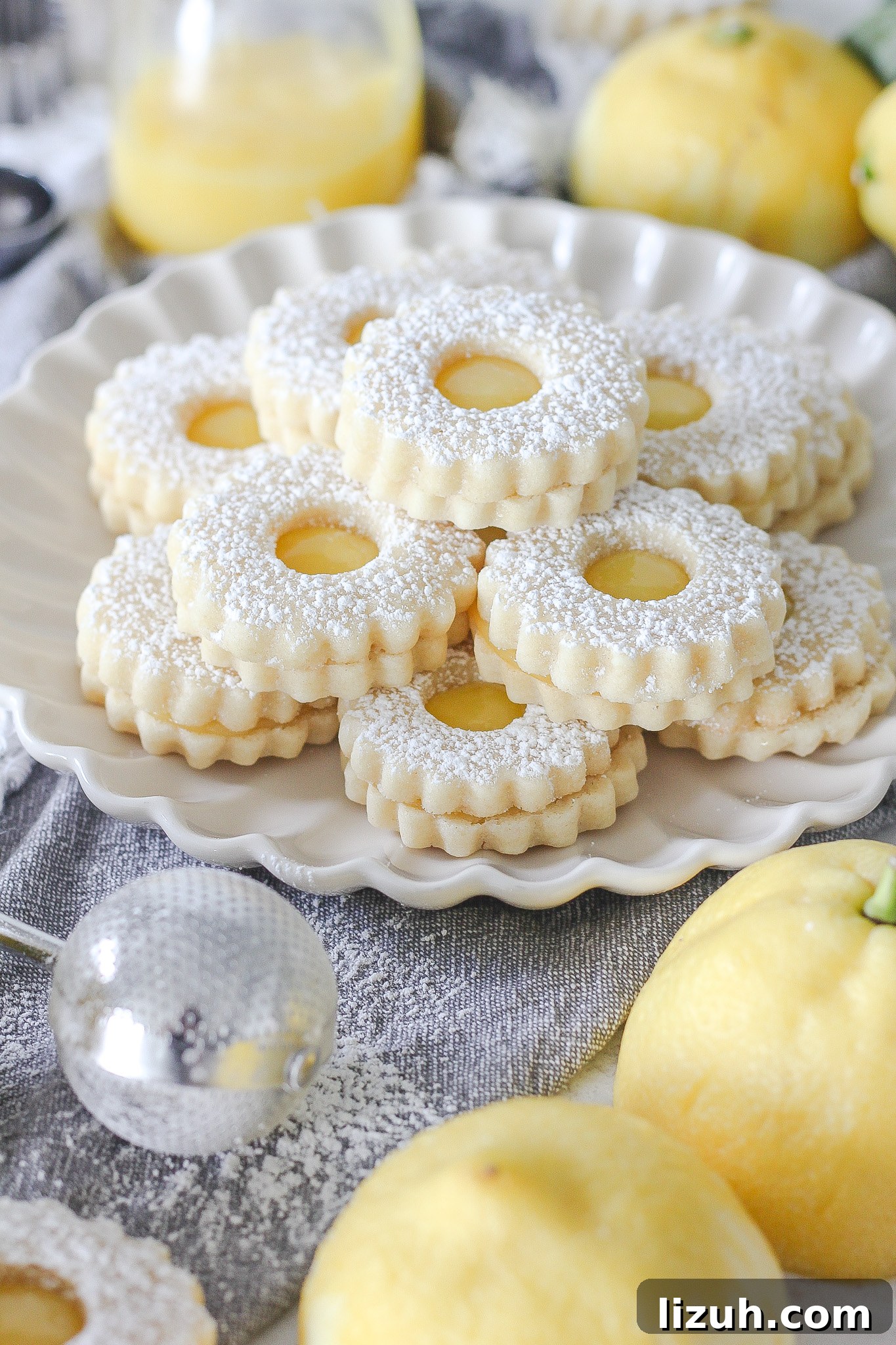 Lemon Curd Linzer Cookies Recipe — Zesty Jam-Filled Shortbread 3 Cut out linzer cookies