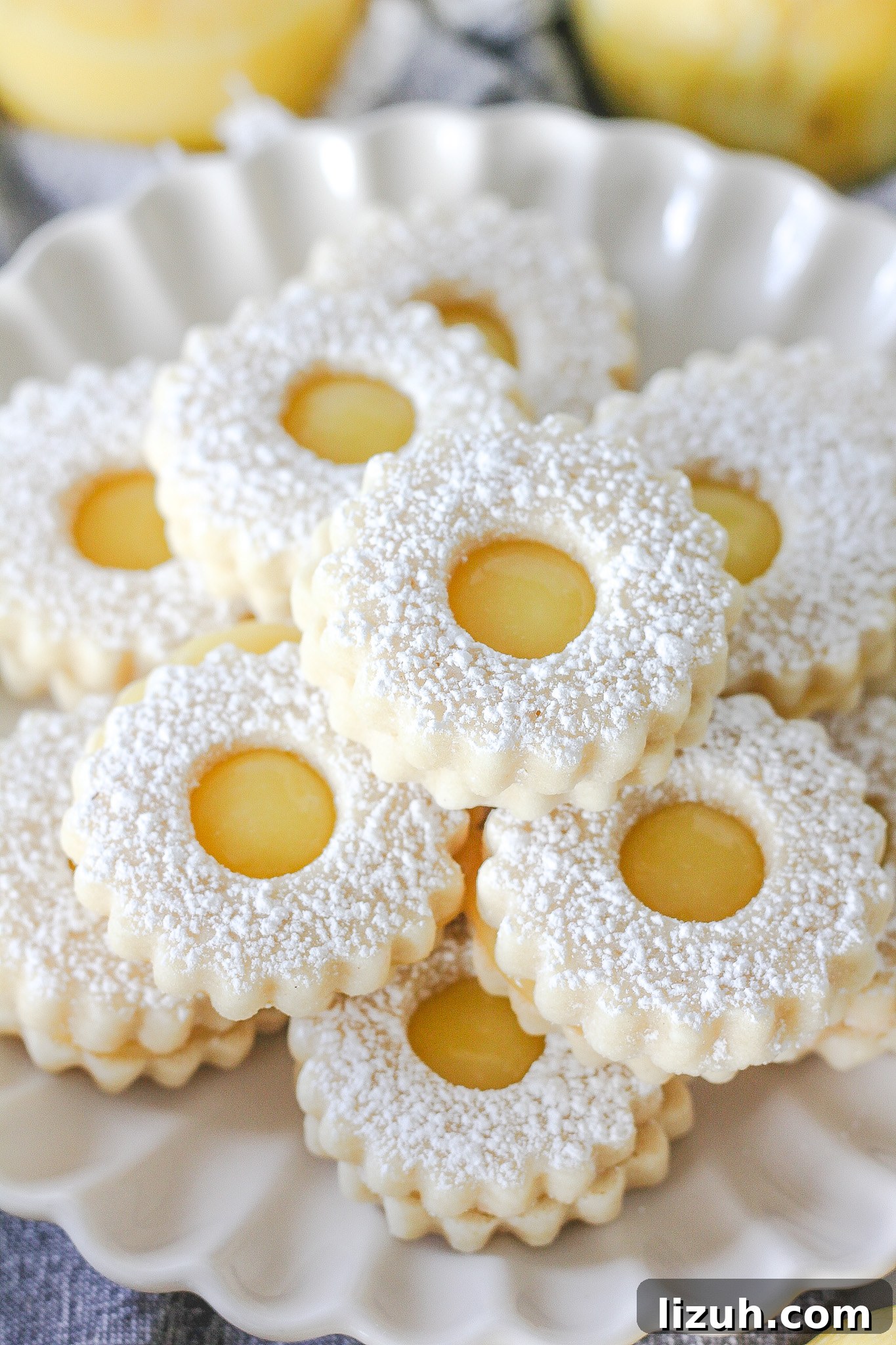 Lemon Curd Linzer Cookies Recipe — Zesty Jam-Filled Shortbread 7 Finished linzer cookies