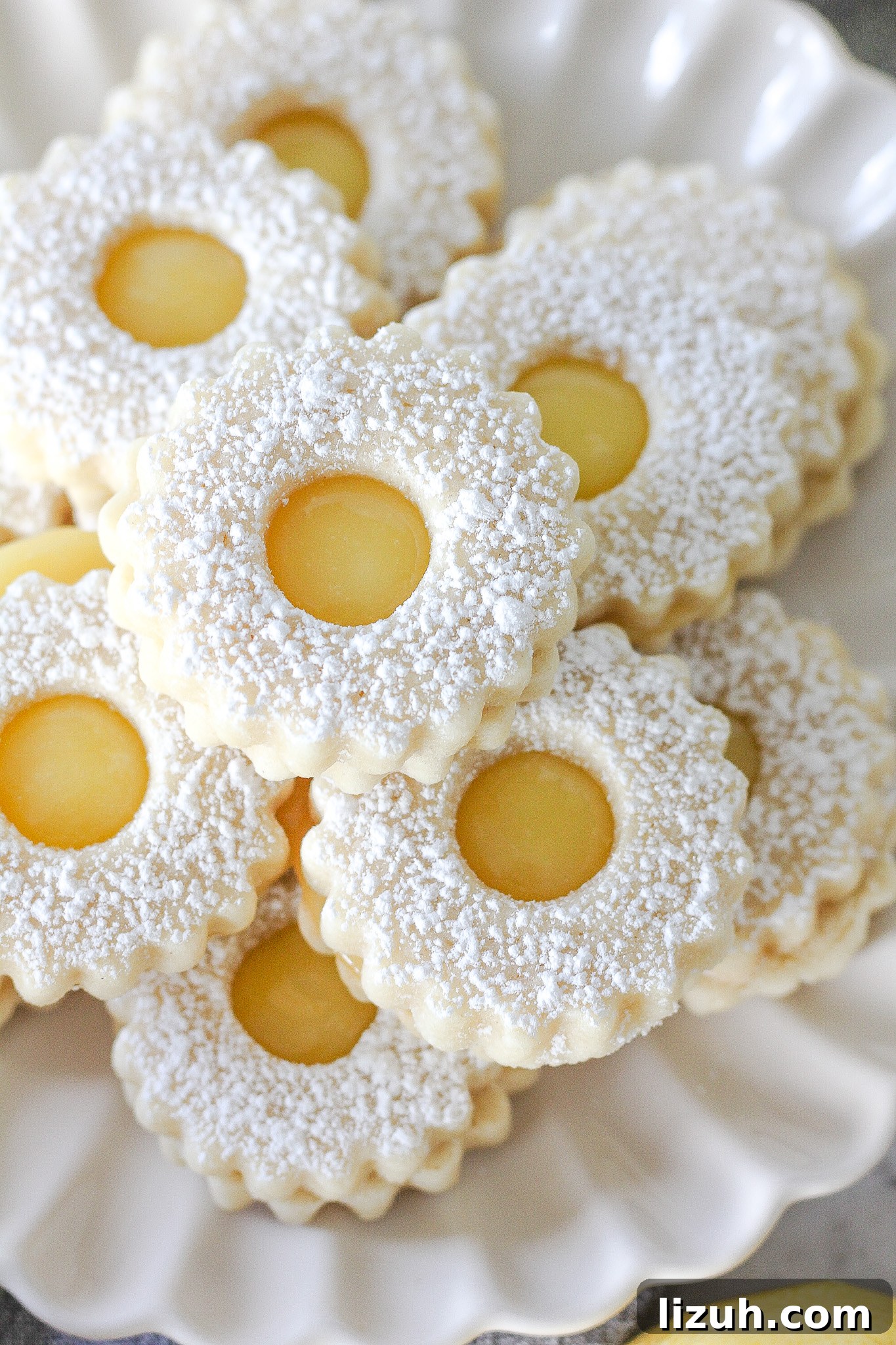 Lemon Curd Linzer Cookies Recipe — Zesty Jam-Filled Shortbread 8 Linzer cookie thumbnail