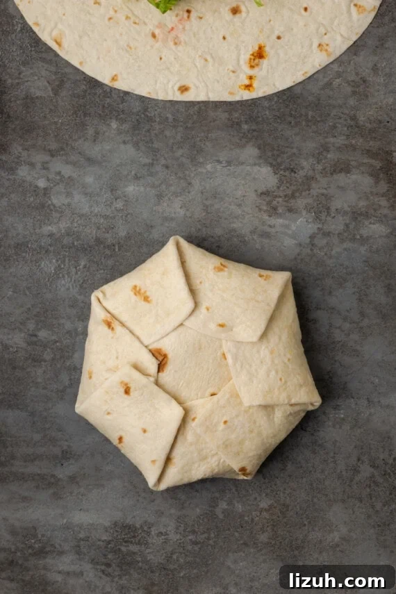 A folded crunch wrap on a countertop.