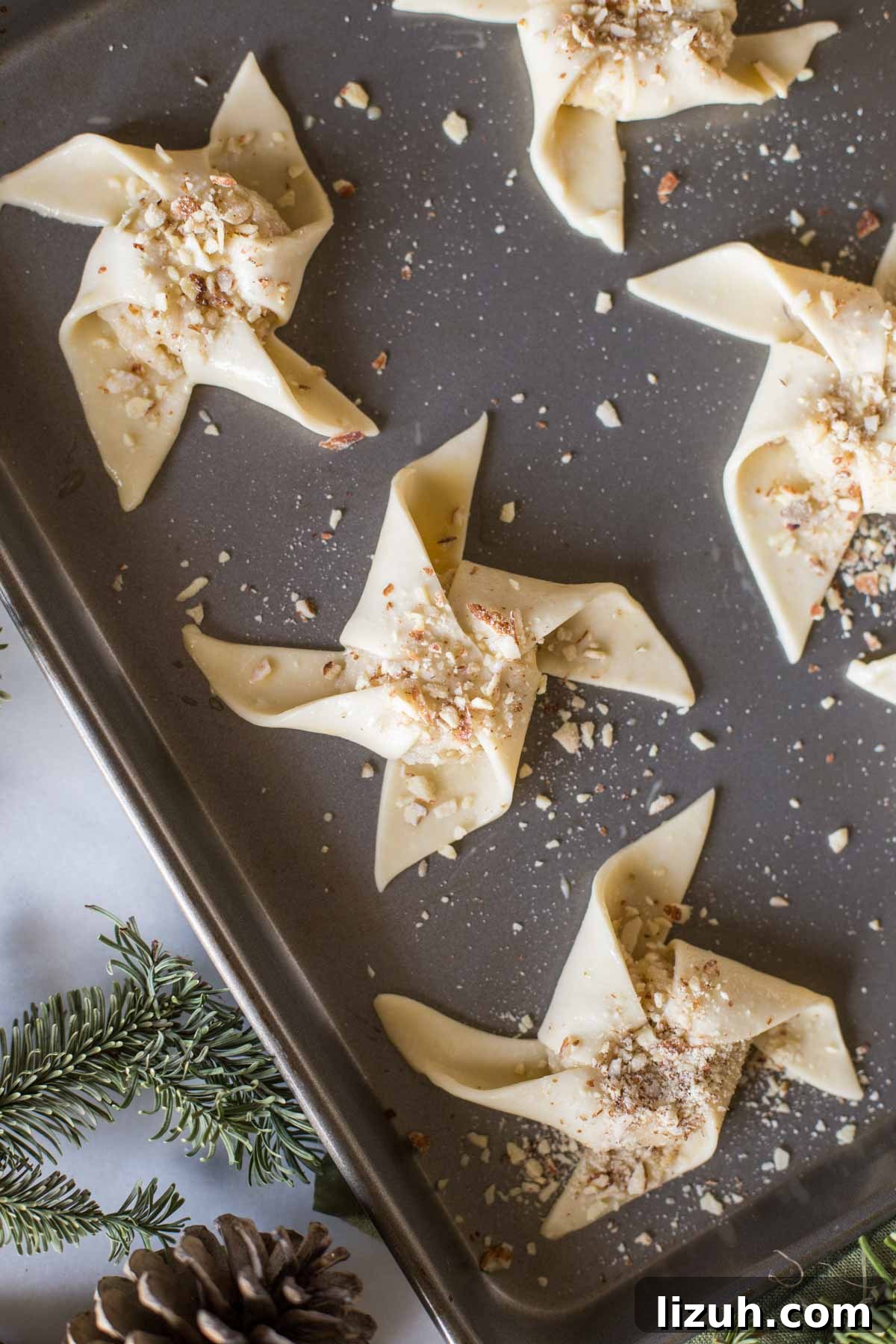 Make Ahead Almond Pinwheels on a baking sheet before being baked.  