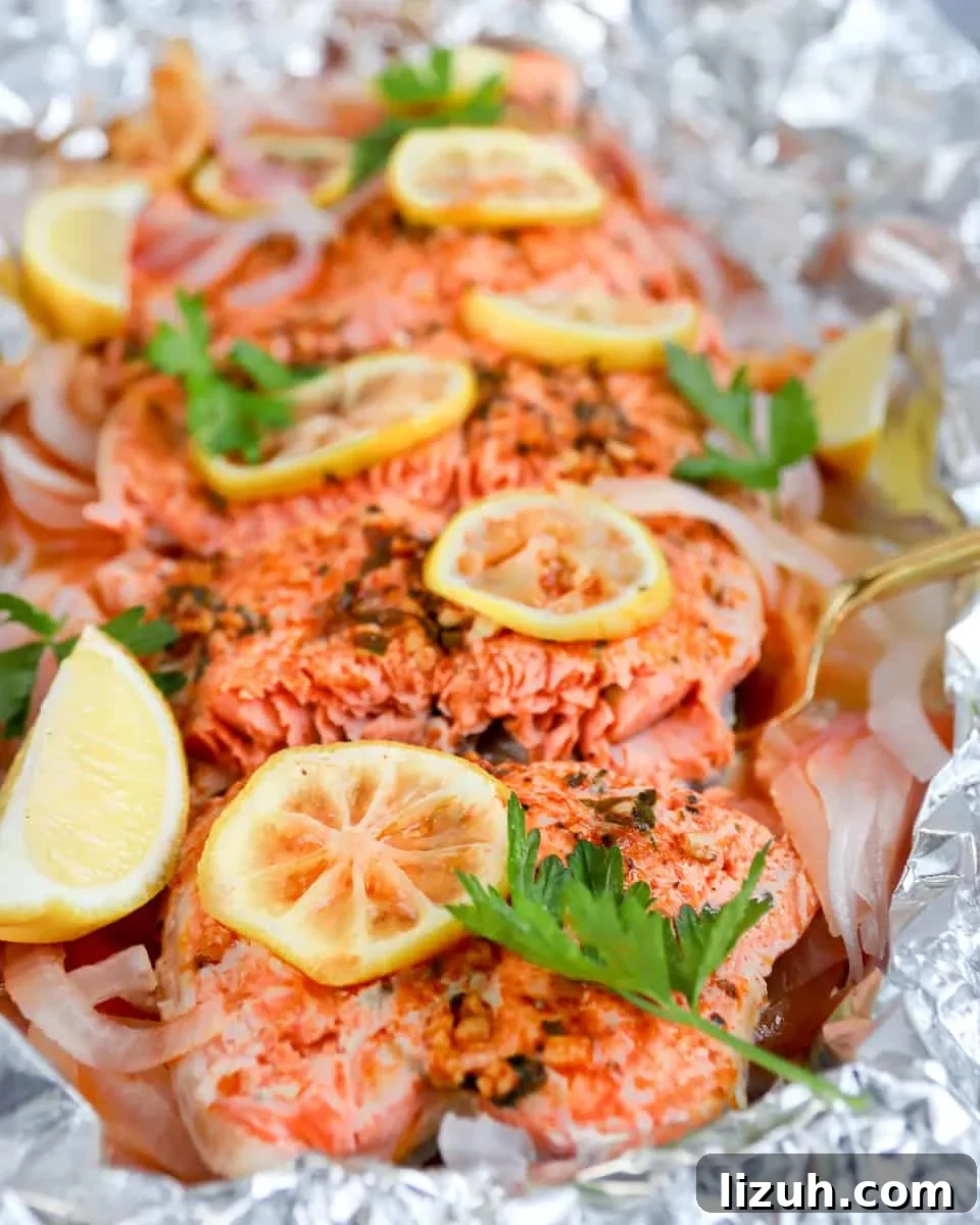 Grilled Salmon in Foil with Smoked Paprika and Fresh Herbs 3 Smoked paprika herb salmon grilled in foil is a flavorful, almost effortless main dish. Season, cook, serve right in the foil. Get this foil grilled salmon recipe on GoodieGodmother.com