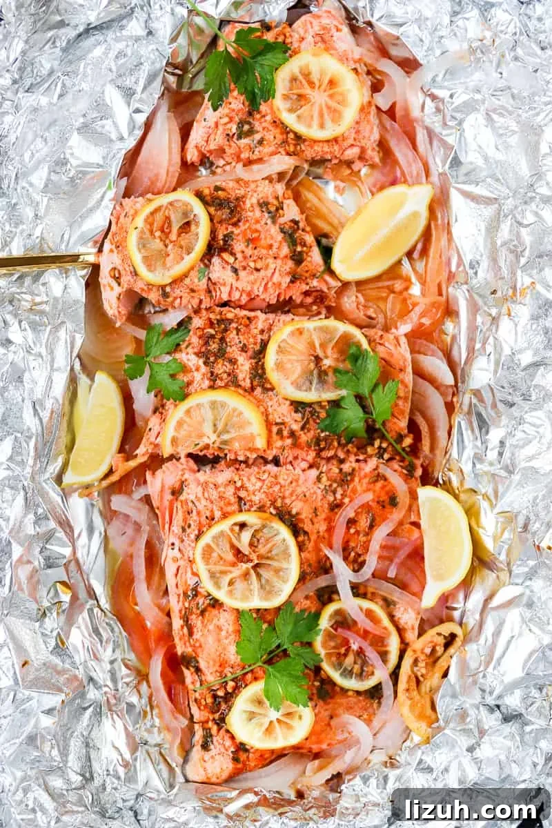 Grilled Salmon in Foil with Smoked Paprika and Fresh Herbs 4 Smoked paprika herb salmon grilled in foil is a flavorful, almost effortless main dish. Season, cook, serve right in the foil. Get this foil grilled salmon recipe on GoodieGodmother.com