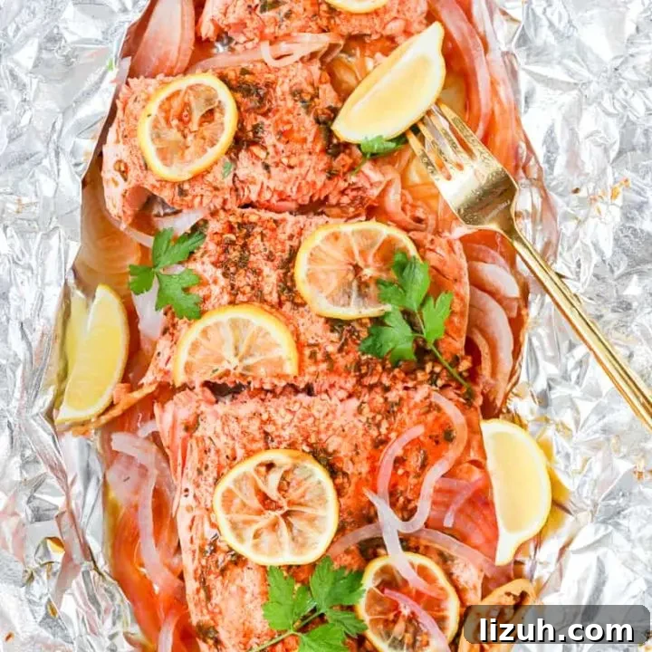 Smoked paprika herb salmon grilled in foil is a flavorful, almost effortless main dish. Season, cook, serve right in the foil. Get this foil grilled salmon recipe on GoodieGodmother.com