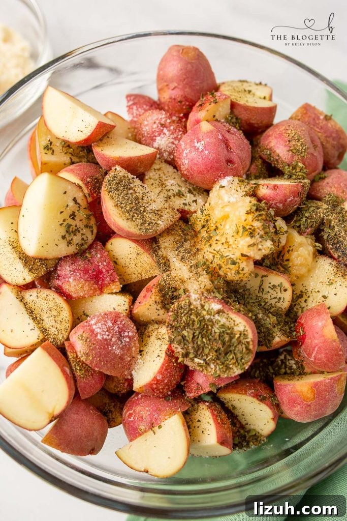 Crispy Garlic Parmesan Roasted Potatoes Recipe 5 Tossing Garlic Parmesan Roasted Potatoes